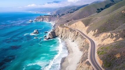 Scenic coastal highway winding along dramatic cliffs, turquoise ocean, and sandy beach.