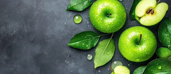 Fresh Granny Smith Apples with Water Droplets on a Dark Textured Background