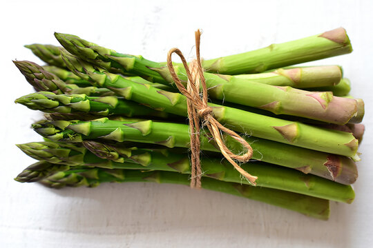 Fresh green asparagus bundle tied with twine