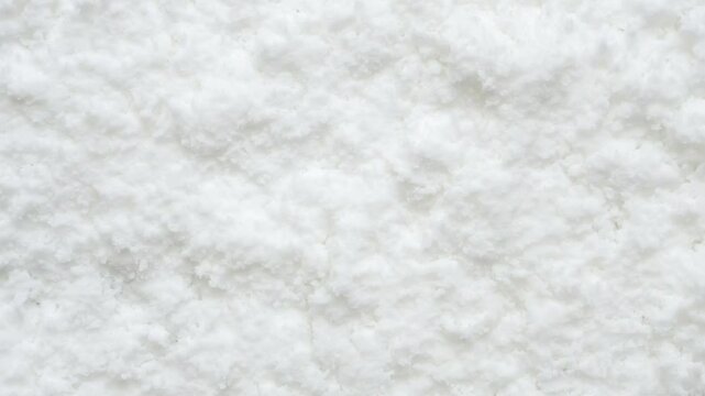 White snow texture background high angle view stop motion