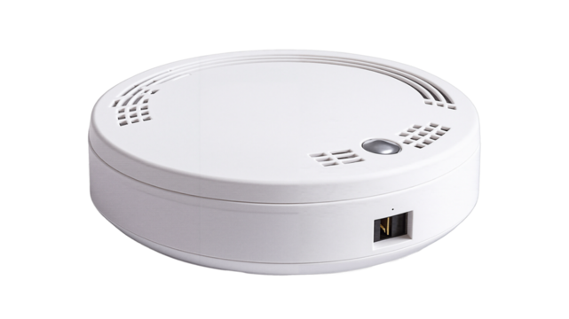 White carbon monoxide detector on a flat surface, concept of isolate, no background  