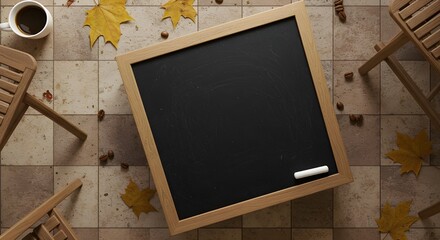 Black chalkboard diagonally placed on tile, surrounded by caf&eacute; props&mdash;leaves, chairs, cup&mdash;styled for branding visuals.