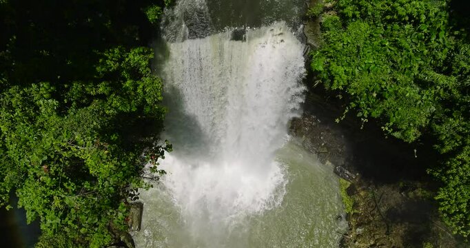 Top down view of Falls in green forest. Waterfall in the tropical mountain jungle. Lake Sebu. Mindanao, Philippines. Travel concept.