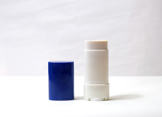 Sun stick on white background, sunscreen