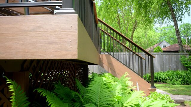 Element of the exterior, new deck with stairs on the backyard , slow move wide camera shot