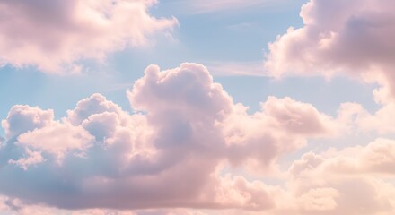 Fototapeta premium Dreamy Pastel Skies: Fluffy Clouds in Soft Light