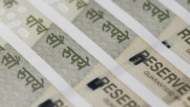 New indian currency 500 rupees note from Reserve Bank of india with print in english and hindi language. push back, 4k.