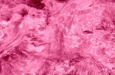 Abstract marble background of different shades of pink. Red and brown pastel pink of impregnation. Colors randomly intersect and mix. Different textures.