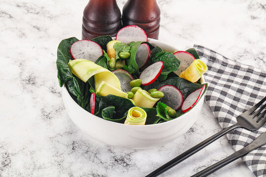 Green salad with zucchini and spinach - Powered by Adobe