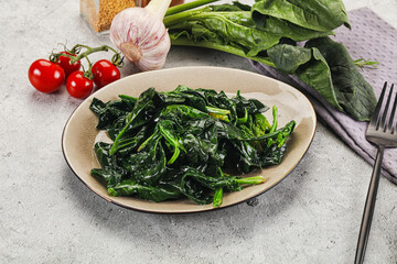 Coocked green spinach with oil