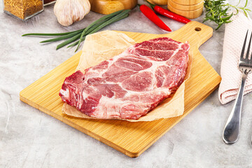 Raw pork neck steak for grill