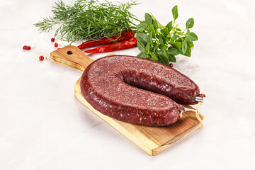 Delicious dry cured beef basturma on table, closeup