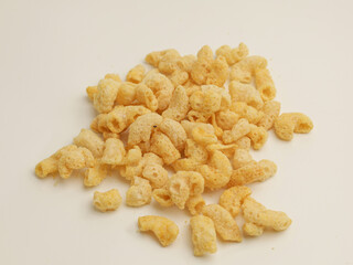 Crunchy snacks or chips on white background