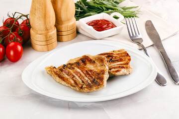 Grilled pork steak with sauce