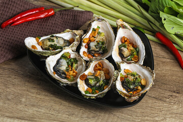 Baked oysters with green onion