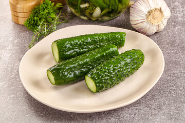 Homemade lighty salted cucumbers with herbs