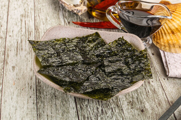 Green nori seaweed chips with soya sauce