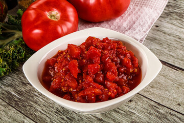 Diced ripe tomato with sauce