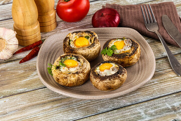 Baked champignon with quail egg