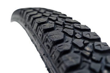 Tire track on road shows isolated wheel trace indicating vehicle movement during daytime in an urban setting