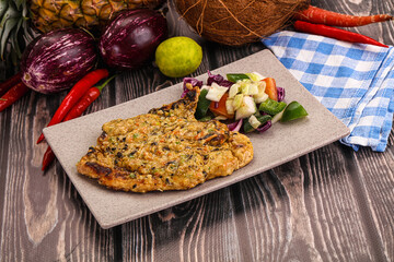 Tasty chicken steak with vegetables