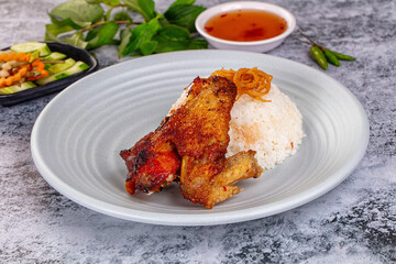 Spicy roasted chicken wing with rice