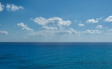Blue sea and sky horizon , Calm Ocean Under a Blue Sky