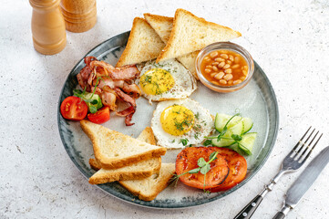 English breakfast with toast in a cafe