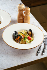pasta with mussels sauce and lemon