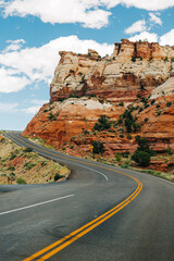 Winding highway, red rock cliffs at Calf Creek Recreational Area