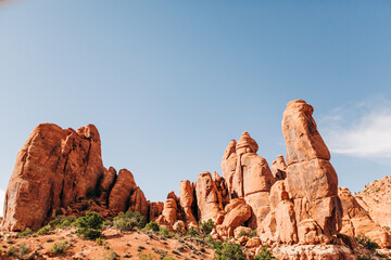 Fototapeta premium Red rock pinnacles under a blue sky in Arches National Park, Utah
