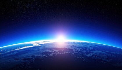 Obraz premium Dramatic view of Earth from Space during sunrise showing glowing atmosphere