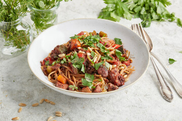 Mediterranean vegetable bolognese on a white plate