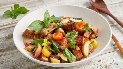 Panzanella with peach, tomato and basil