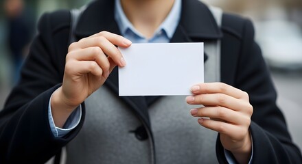 Woman in Black Coat Holding Blank White Card, Mockup Design, Business, Advertisement