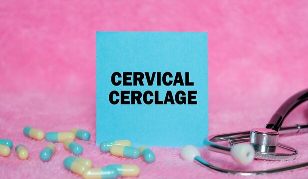 Cervical Cerclage writing concept on sticky note isolated on pink background. stethoscope as decoration.