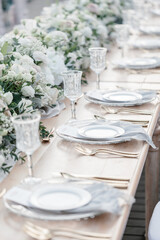lovely Table setting for magnificent composition from flowers at a wedding , Centerpiece white and...