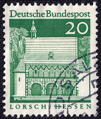 Gatehouse of Lorsch (Hessen) on a 1967 Germany vintage postage stamp. German buildings from twelve...