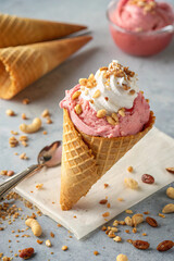 Italian Gelato Cone with Whipped Cream and Nuts.
