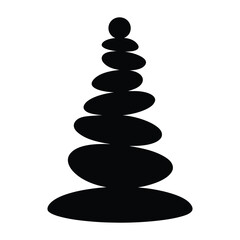 Silhouette of rock cairns stacked for balance zen-style
