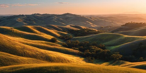 Fototapeta premium Serene Sunset Over Rolling Hills Landscape