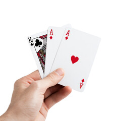 A hand holding three playing cards, one of which is a King