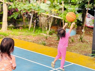 Playing basketball on the open court