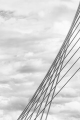  Modern architecture of Millennium Bridge against cloudy sky in Podgorica, Montenegro dynamic...