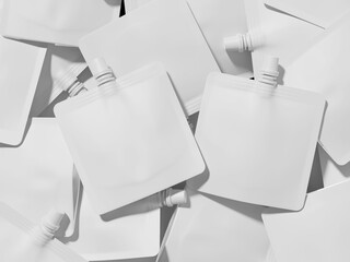 White Blank Spout Pouch Mockup 3D Rendering Product Sample in Disarray Layout