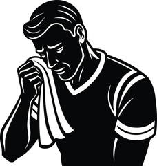 a tired footballer wiping
