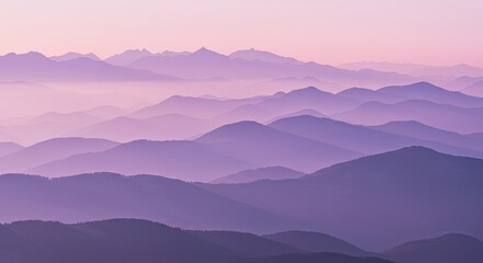 Obraz premium Lavender Hues of Misty Mountain Ranges at Dawn.