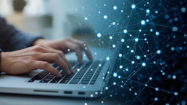 hands typing on a laptop