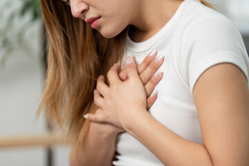Health Awareness: Young Woman Experiencing Chest Pain