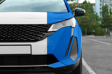 Modern white auto before and blue after painting outdoors, closeup. Comparative collage of car...